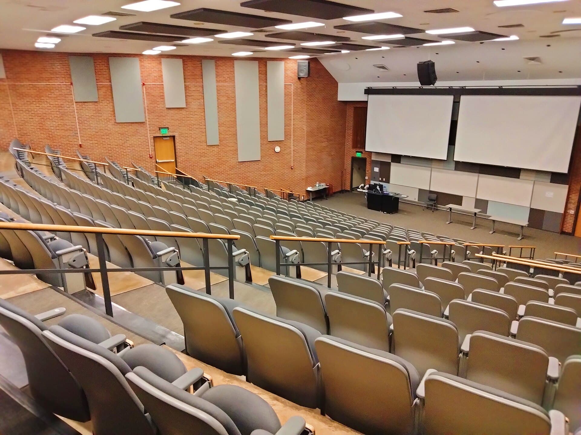 A modern university lecture hall with tiered seating